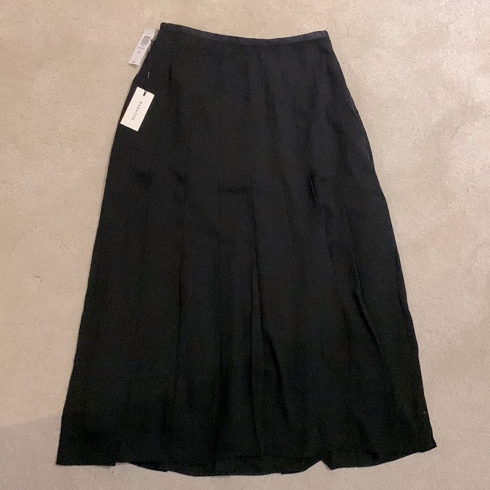 Babaton Black Midi Skirt from Aritzia.